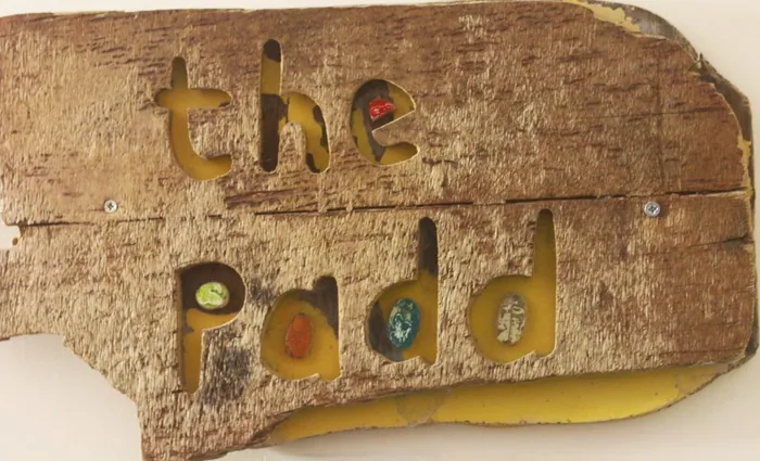 The hand-carved sign for The Padd, our self-contained apartment